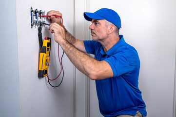 Electrician Testing a Toggle Switch Inside a Home