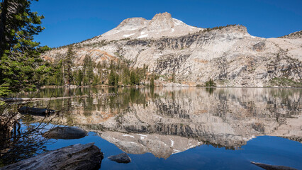 Mount Hoffmann reflecting off of May Lake in Yosemite National Park