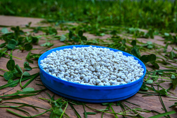 Heap of composite mineral fertilizers.