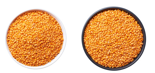 organic red lentils in a ceramic plate isolated on white background top view.