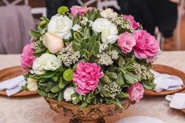 a bouquet of white and pink flowers
