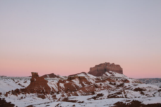 Snowy landscape in Utah with red rock formations