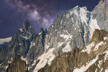 Papier peint photo autocollant rond Mont Blanc Alpine landscape with night sky and milky way over Pointe Helbronner of the Massif of Mont Blanc, France