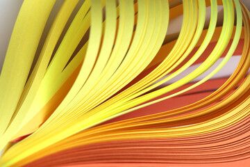 Abstract color yellow and red strip curl wave line paper background.