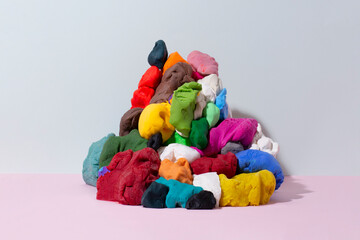 Large pile of colourful messy plasticine 