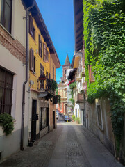 Fototapeta na wymiar Charming Italian Town Road in Summer, Rivoli, Piedmont