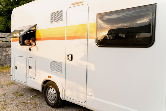 Family trip in a RV. Father and daughter together