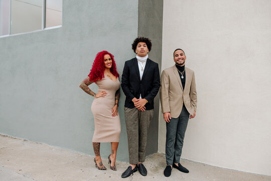 Curvy red-haired mom with sons 