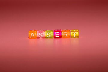 the word "assert" made up of cubes