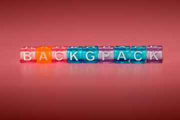 the word "backgpack" made up of cubes