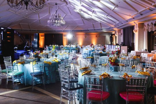 Luxury restaurant with designed interior and served tables for event