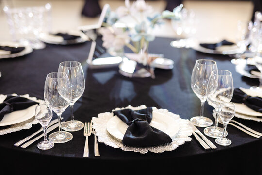 Table in restaurant prepared for festive banquet 