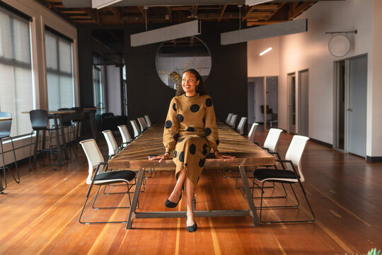 Pretty executive woman at meeting room table
