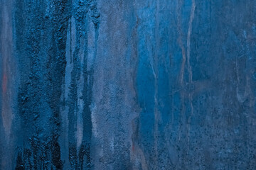 Blue metal surface with dark traces of fuel oil old steel texture industrial background