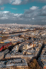 Fototapeta premium January 20 2022: Aerial view of Paris, the French capital from the Eiffel Tower