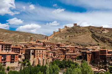 landscape showing the village of Albarracin with its wall and castle in Spain