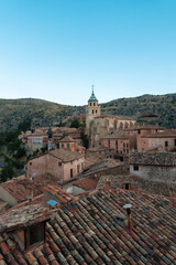Fototapeta na wymiar view of the roofs and tower of the church of albarracin, historic village of Spain
