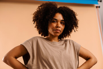 Brazilian woman with afro hair studio portrait