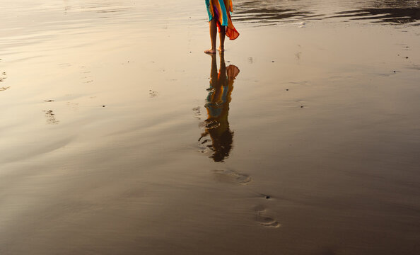 woman walking in the beach