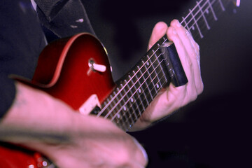 Guitarist Plays With Finger Slide