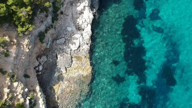 Aerial view over Chrisi Milia beach and the rocky surrounded area in Alonissos island, Greece