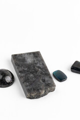 Variety of Iridescent Labrdorite Stone Specimens on White Background. Feldspar mineral
