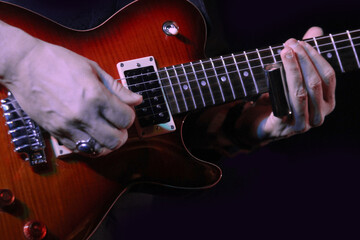 Guitarist Plays With Finger Slide