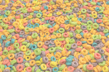 Sweet multicolored flakes, cereal loops.