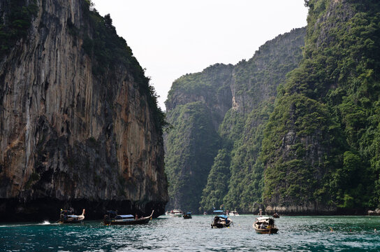 Boats and cliffs in Koh Phi Phi Thailand