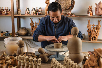 Artisan working with clay