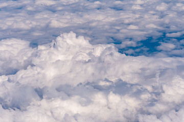 Clouds outside my airplane window from a comfortable cruising altitude 