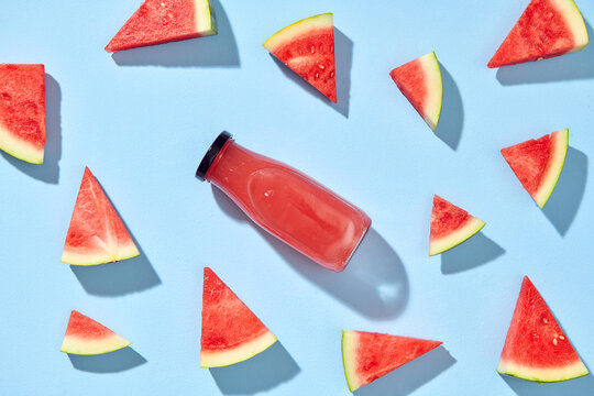 Fresh tasty watermelon smoothie in glass bottle