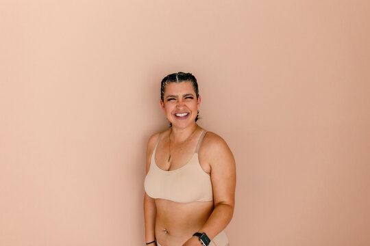 Squinting woman in underwear