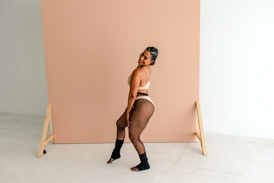 Dancer wearing thong over fishnets