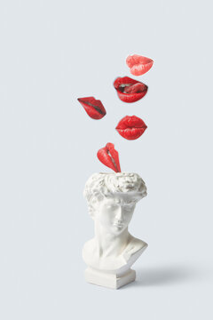 Kisses falling inside head statue