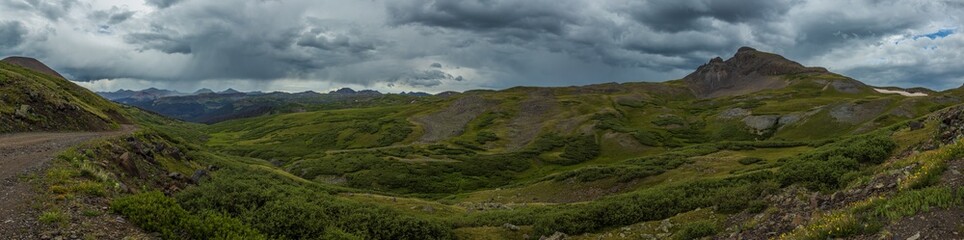 panorama of the high tundra mountains with raining skies