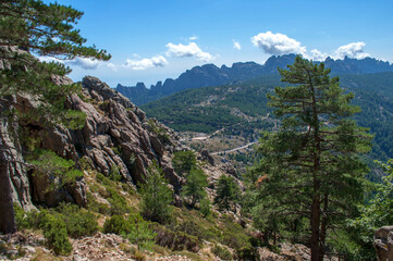 Fototapeta na wymiar Rocks and mountains in Bavella Park on the island of Corsica