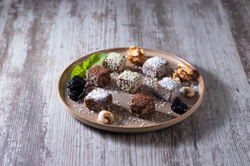 Homemade healthy handmade sweets in a plate on the table. Concept: healthy food.