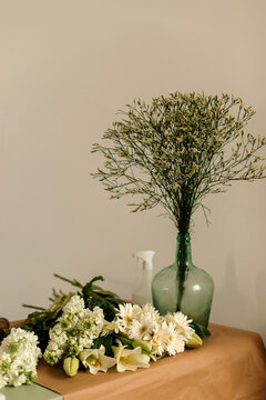 Vase and flowers in floral studio