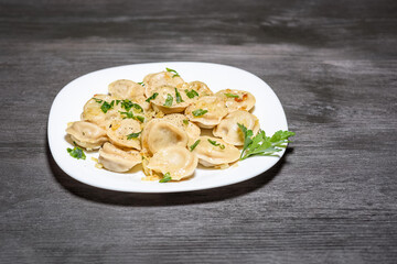 Pelmieni with fried onion or in broth