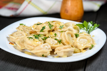 Pelmieni with fried onion or in broth