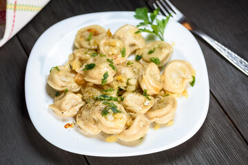 Pelmieni with fried onion or in broth