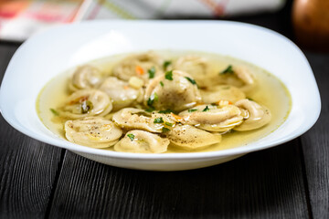 Pelmieni with fried onion or in broth