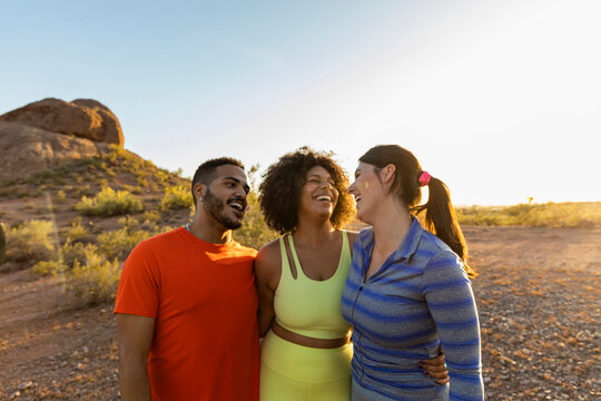 Group Lifestyle of Friends together while hiking in Arizona landscape