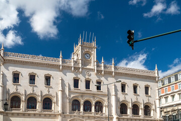Fototapeta na wymiar Lisboa, Portugal. April 10, 2022. Rossio train station and blue sky in summer day.