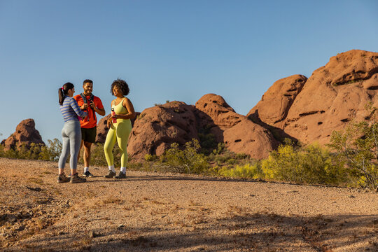 Southwest Desert Landscape with Gen z friends Hiking together 