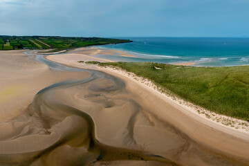 panorama drone landscape view of the beautiful golden sand beach at Lacken Strand on the coast of...