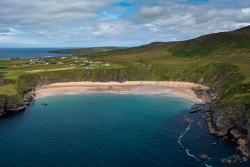 drone aerial view of the beautiful Silver Strand and horseshoe bay at Malin Beg on the Wild Atlantic Way of Ireland