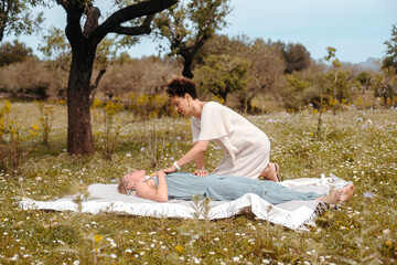 Therapist supporting patient