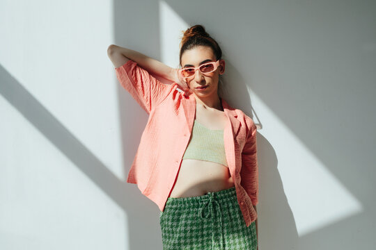 Trendy young woman resting under sunlight - Summer fashion